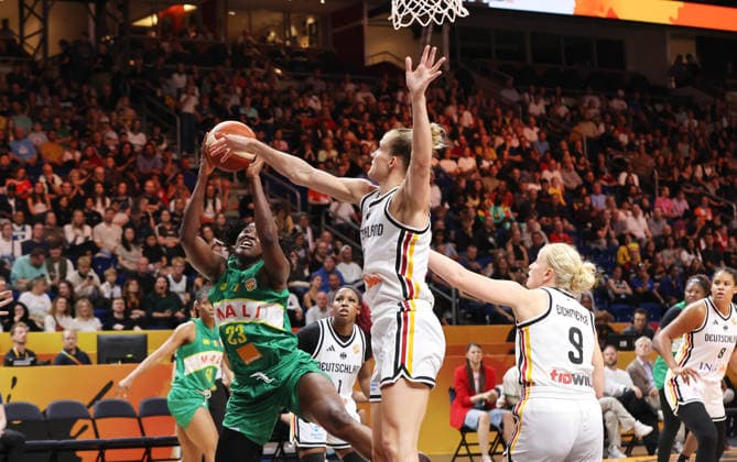 Sika Kone on the ball, Leonie Fiebich, Emma Eichmeyer, one-on-one, game play, action, sports, basketball, FIBA World Cup, Women s World Championship, 2026-2027 season, July 9, 2026, DBB, Germany (GER) vs. Mali