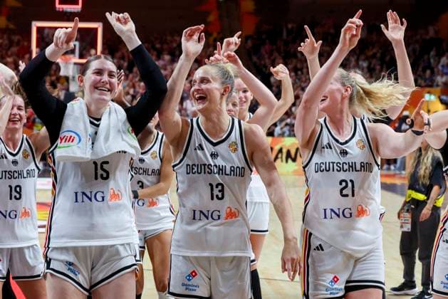 Luisa Geiselsoder (Germany), Leonie Fiebich (Germany), and Marie Guelich (Germany) cheer during the FIBA Women s Basketball World Cup Germany 2026 group match between Germany and Mali at the Berlin Arena on September 7, 2026, in Berlin, Germany. Photo by Marco Steinbrenner, DeFodi Images