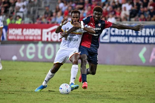 IPA88247870 - Lassana Coulibaly of US Lecce and Michel Adopo of Cagliari Calcio during the Cagliari Calcio vs. US Lecce Italian Serie A soccer match in Cagliari, Italy, on September 7, 2026  Copyright: xLuigixCanu IPAxSportx xx IPA88247870