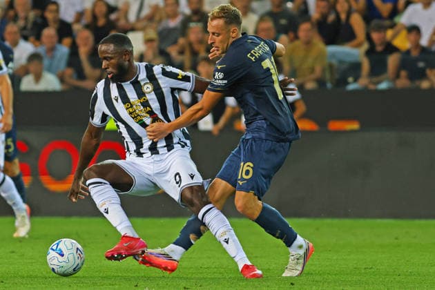 Udinese s Keinan Davis fights for the ball with Lazio™s davide frattesi during the Serie A soccer match between Udinese and Lazio at the Friuli Stadium in Udine, north east Italy - September 07, 2026. - Soccer  Copyright: xAndreaxBressanutti LaPressex