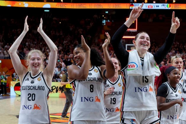 Frieda Buhner (Germany), Nyara Sabally (Germany), and Luisa Geiselsoder (Germany) cheer during the FIBA Women’s Basketball World Cup Germany 2026 group match between Germany and Mali at the Berlin Arena on September 7, 2026, in Berlin, Germany. Photo by Marco Steinbrenner, DeFodi Images