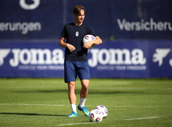 Soccer, Men s, Bavarian Regional League, 2026–2027 Season, TSV 1860 Munich, Training at Grünwalder Strasse 114, Raphael Ott Training Facility: TSV 1860 Munich player standing with a ball in his left arm