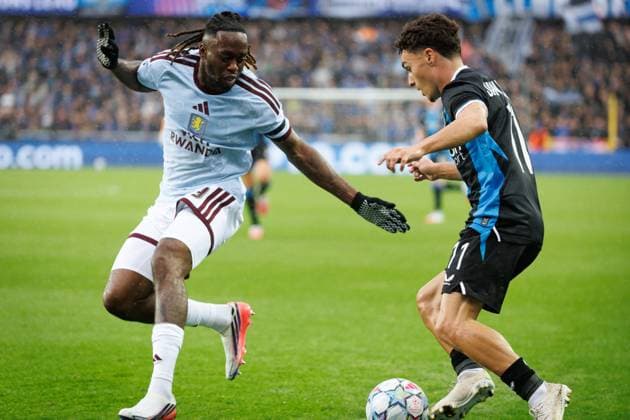 Aston Villa s Aaron Wan-Bissaka and Club s Jan Virgili fight for the ball during a soccer game between Belgian soccer team Club Brugge KV and English Aston Villa FC, on Tuesday 8 September 2026 in Brugge, on the first game of the UEFA Champions League league phase. KURTxDESPLENTER  x185678550x