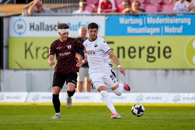 v li Linus Weik SGV, 14, Mert Tasdelen SVS, 11, tackle, game action, duel, tackle, tackling, dynamics, action, 08 09 2026, Sandhausen, Germany, soccer, Regionalliga Südwest, SV Sandhausen, SGV Heilbronn Freiberg xozx