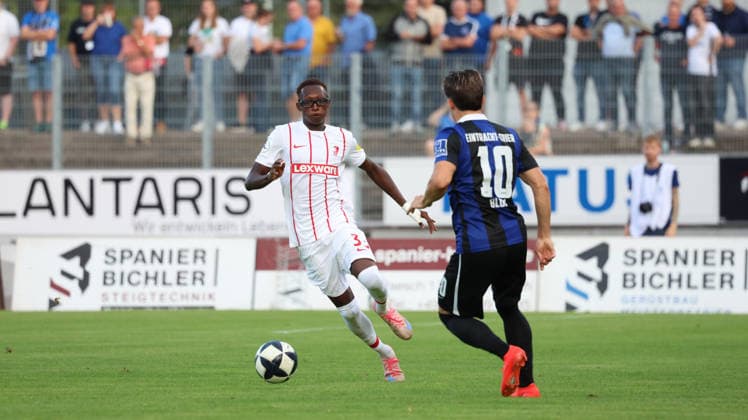 September 8, 2026, xrekx, Regionalliga Southwest soccer, Eintracht Trier vs. SC Freiburg II, Bismark Adomah (SC Freiburg II), Shawn Blum (SV Eintracht Trier 05 Trier)