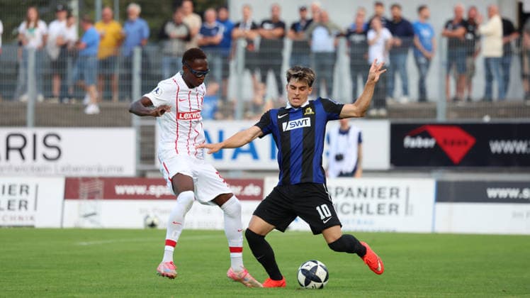 September 8, 2026, xrekx, Regional League Southwest Soccer, Eintracht Trier vs. SC Freiburg II – Bismark Adomah (SC Freiburg II) vs. Shawn Blum (SV Eintracht Trier 05) – Tackle, Action, battle for the ball – Trier