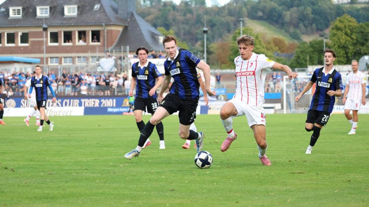 September 8, 2026, xrekx, Regional League Southwest Soccer, Eintracht Trier vs. SC Freiburg II – Tim Sausen, SV Eintracht Trier 05, Marius Klein, SC Freiburg II – Tackle, Action, Battle for the Ball, Trier