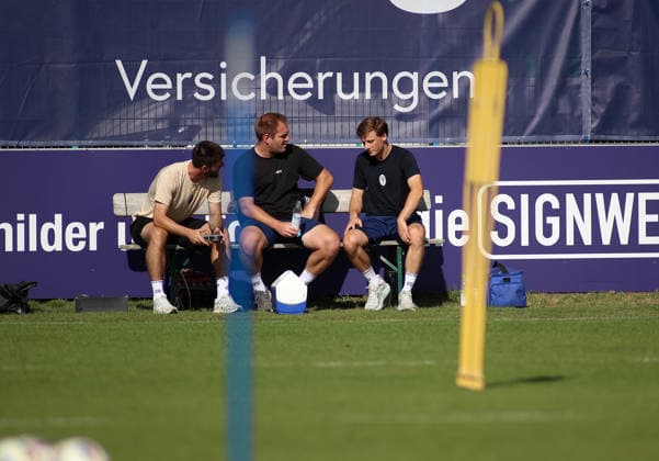 Soccer, Men s, Bavarian Regional League, 2026–2027 Season, TSV 1860 Munich, Practice at Grünwalder Strasse 114, Moritz Seiffert Training Facility, TSV 1860 Munich—currently injured, sitting on a bench at the practice field—re