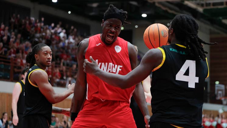 Pictured: Charles Thompson of the Würzburg Baskets, No. 32, celebrating after a dunk, with Tyrel Morgan of the Kreisbau Kirchheim Knights, No. 11, to his right, August 9, 2026, Fitness First Würzburg Baskets vs. Kreisbau Kirchheim Knights, exhibition game, Germany, 97072, tectake Arena Würzburg, Copyright: HMBxMedia xJulienxBecker