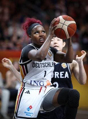 Germany s Alexis Peterson and Korea s Haeran Lee fight for the ball during a basketball game between Germany and South Korea, game 3 of the group phase at the FIBA Women s Basketball World Cup, on Tuesday 8 September 2026, in Berlin, Germany. The FIBA Women s Basketball World Cup takes place in Berlin from 4 to 23 September 2026. VIRGINIExLEFOUR  x185686685x