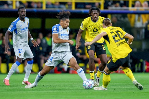 September 8, 2026, Soccer, UEFA Champions League, Borussia Dortmund vs. Villarreal CF, Champions League Matchday 1, Signal Iduna Park, 2026–27 Season: Nathan Saliba (Villarreal CF, No. 24) in a tackle against Joane Gadou (BVB, No. 22) and Marcel Sabitzer (BVB, No. 20). DFB regulations prohibit any use of photographs as image sequences and or quasi-video. North Rhine-Westphalia, Germany