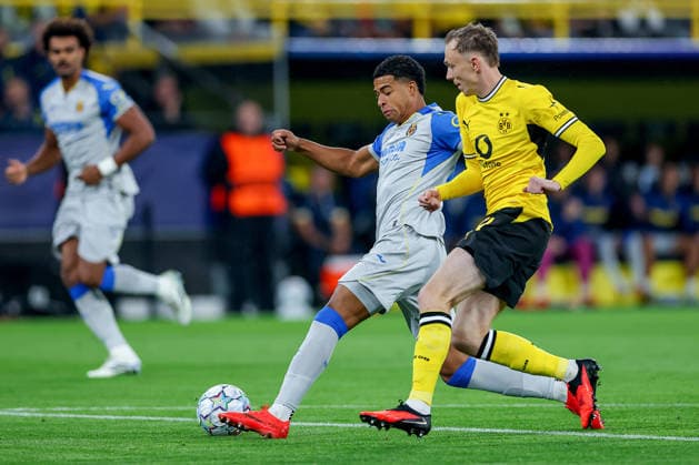 September 8, 2026, Soccer, UEFA Champions League, Borussia Dortmund vs. Villarreal CF, Champions League Matchday 1, Signal Iduna Park, 2026–27 Season: Santiago Mourino (Villarreal CF, No. 15) in a tackle against Maximilian Beier (BVB, No. 14). DFB regulations prohibit any use of photographs as image sequences and or quasi-video. North Rhine-Westphalia, Germany