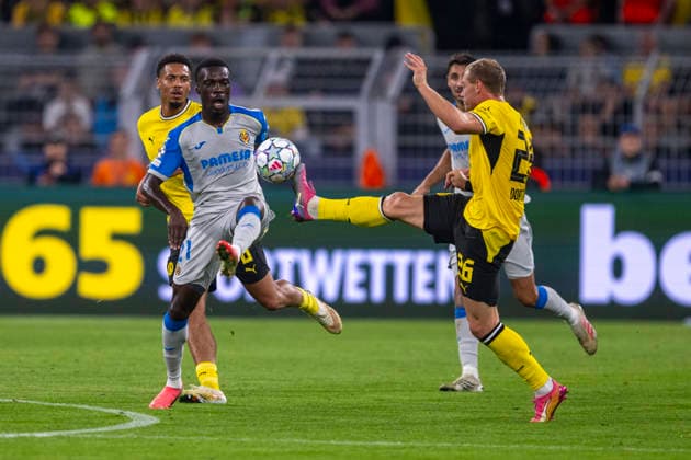 September 8, 2026 Champions League: Borussia Dortmund vs. FC Villarreal at Signal Iduna Park. Oluwaseyi Tani (FC Villarreal) and Julian Ryerson (Borussia Dortmund) battle for the ball. IMPORTANT NOTICE: In accordance with DFL and UEFA regulations, it is prohibited to use or allow the use of photographs taken in the stadium and or during the match in the form of sequential images and or video-like photo sequences. Copyright: xDavidxInderliedx
