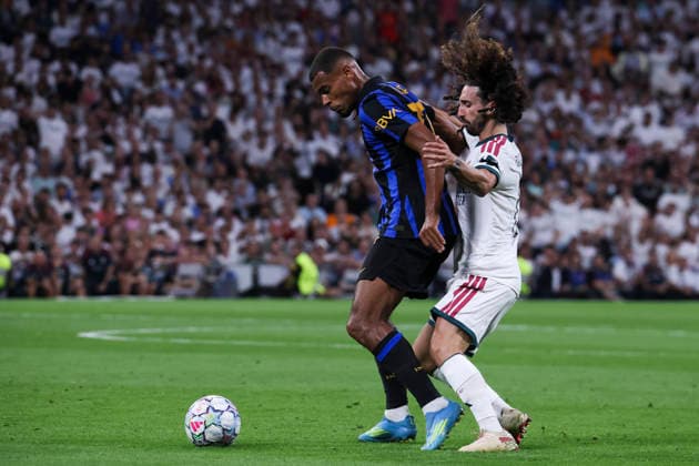 Real Madrid vs. FC Internazionale Milano, UEFA Champions League 2026–27, September 8, 2026, Santiago Bernabéu Stadium, Madrid, Spain Andy Diouf of Internazionale Milano battles for the ball against Marc Cucurella during the UEFA Champions League 2026–27 soccer match between Real Madrid and FC Internazionale Milano at Santiago Bernabéu Stadium on September 8, 2026, in Madrid, Spain Madrid Santiago Bernabéu Stadium Madrid Spain Copyright: xAlejandroxMatiasxAcostax