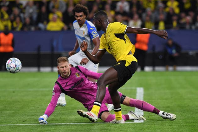 Goalkeeper Peter Gulacsi of Villarreal CF and Serhou Guirassy of Borussia Dortmund battle for the ball during the 2026–2027 UEFA Champions League match between Borussia Dortmund and Villarreal CF at BVB Stadion on September 8, 2026, in Dortmund, Germany. Photo by Ralf Treese, DeFodi Images. Goalkeeper Peter Gulacsi of Villarreal CF and Serhou Guirassy of Borussia Dortmund battle for the ball during the 2026–2027 UEFA Champions League match between Borussia Dortmund and Villarreal at BVB Stadion Dortmund on September 8, 2026 in Dortmund, Germany. Photo by Ralf Treese, DeFodi Images