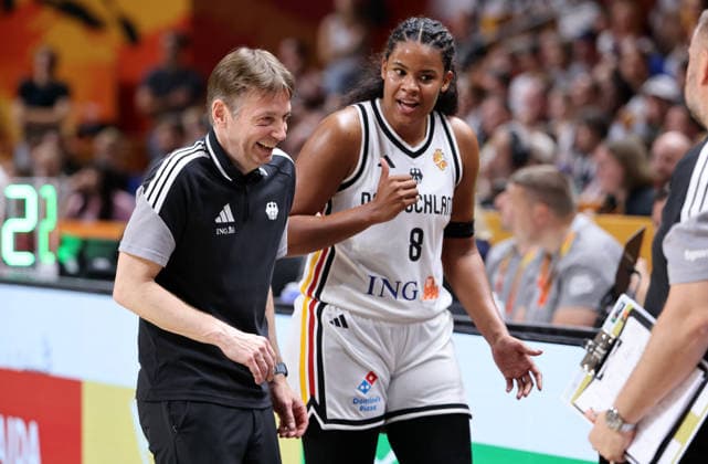 National Team Coach Olaf Lange laughs with Nyara Sabally; Upper Body; Sports; Basketball; FIBA World Cup; Women s World Championship; 2026-2027 Season; August 9, 2026; DBB; Germany (GER) vs. South Korea (KOR)