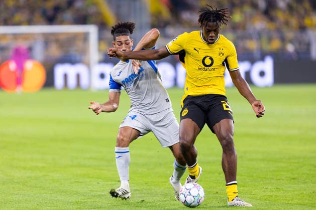 Dortmund, Germany, September 8, 2026; 2026–2027 UEFA Champions League Group Stage Match 1: Borussia Dortmund vs. FC Villarreal. Pictured, from left, in a tackle: Nathan Saliba (VIL) and Joane Gadou (BVB) at Signal Iduna Park, North Rhine-Westphalia. Copyright: xFotostandx xZeisingx