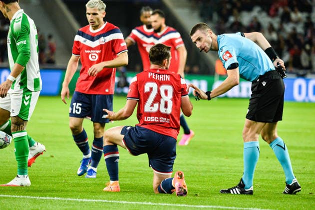 FOOTBALL : Lille OSC vs Real Betis Balompie - Ligue des Champions - Phase de Ligue - JournÃ e 1 - 08 09 2026 Gaetan Perrin (Lille OSC) Georgi Kabakov (Arbitre Central) Villeneuve d AsqcFrance  Copyright: xBaptistexAutissierx