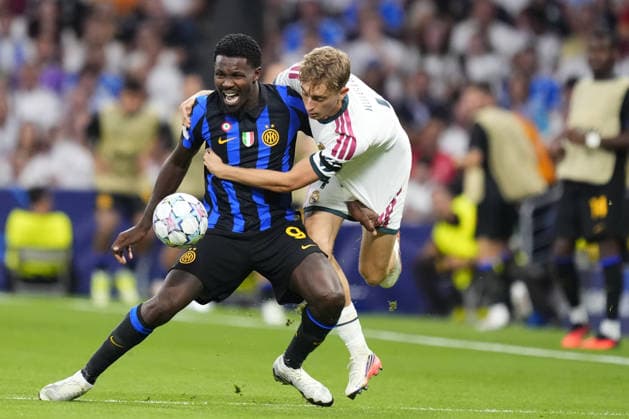 Real Madrid v Inter Milan - UEFA Champions League MADRID, SPAIN - SEPTEMBER 8: Marcus Thuram centre-forward of Inter and France and Dean Huijsen centre-back of Real Madrid and Spain compete for the ball 2during the UEFA Champions League 2026 27 League Phase MD1 match between Real Madrid and Inter Milan at Estadio Santiago Bernabeu on September 8, 2026 in Madrid, Spain. Jose Hernandez Anadolu Madrid Spain. Editorial use only. Please get in touch for any other usage.  Copyright: x2026xAnadoluxJosexHernandezx