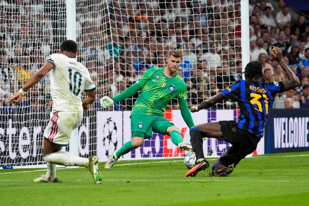 Real Madrid CF s Kylian Mbappe (c) and Football Club Internazionale Milano s Josep Martinez (c) and Yann-Aurel Bisseck during Champions League 2026 2027, League phase, Matchday 1 match. September 8, 2026 (20260909330)