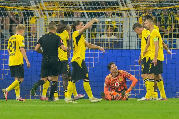 Goalkeeper Gregor Kobel of Borussia Dortmund lies injured on the field during the 2026–2027 UEFA Champions League match between Borussia Dortmund and Villarreal at BVB Stadion Dortmund on September 8, 2026, in Dortmund, Germany. Photo by Alex Gottschalk, DeFodi Images