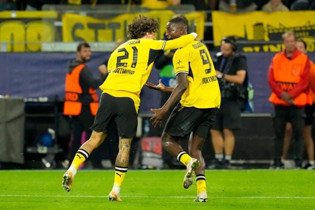 Serhou Guirassy of Borussia Dortmund celebrates after scoring his team s second goal alongside Fabio Silva of Borussia Dortmund during the 2026–2027 UEFA Champions League match between Borussia Dortmund and Villarreal at BVB Stadion Dortmund on September 8, 2026, in Dortmund, Germany. Photo by Alex Gottschalk, DeFodi Images