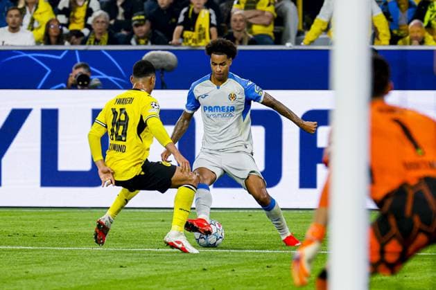 DORTMUND - Tajon Buchanan of Villarreal CF dribbles with the ball under pressure from Ethan Nwaneri of Borussia Dortmund during the UEFA Champions League match between Borussia Dortmund and Villarreal CF at Signal Iduna Park on 08 September 2026 in Dortmund, Germany. MARCEL TER BALS ANP UEFA Champions League 2026 27 xVIxANPxSportx xMarcelxterxBalsxIVx 567694272 originalFilename: 567694272.jpg