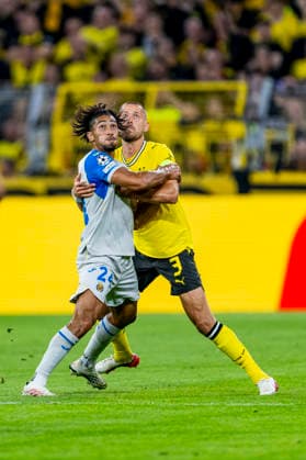 DORTMUND l Villarreal CF midfielder Nathan Saliba and Borussia Dortmund defender Waldemar Anton during the UEFA Champions League match between Borussia Dortmund and Villarreal at BVB Stadion Dortmund on September 8, 2026, in Dortmund, Germany. Photo by DeFodi Images