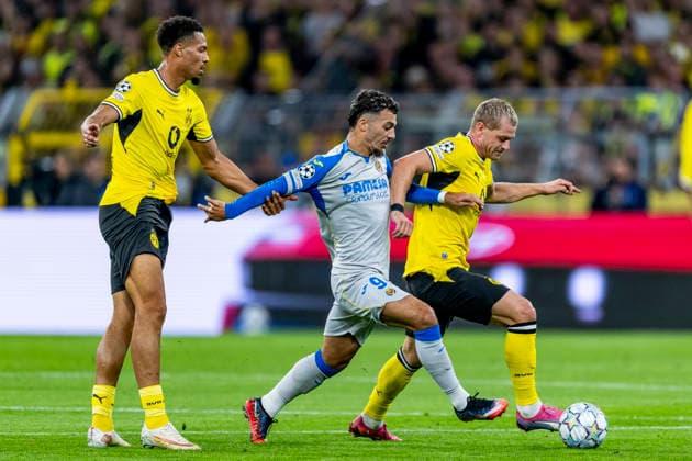 DORTMUND l Borussia Dortmund midfielder Felix Nmecha, Villarreal CF forward Georges Mikautadze, and Borussia Dortmund defender Julian Ryerson during the UEFA Champions League match between Borussia Dortmund and Villarreal at BVB Stadion Dortmund on September 8, 2026, in Dortmund, Germany. Photo by DeFodi Images