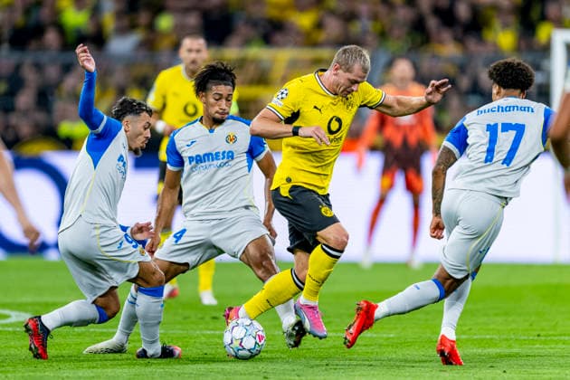 DORTMUND Villarreal CF forward Georges Mikautadze, Villarreal CF midfielder Nathan Saliba, and Borussia Dortmund defender Julian Ryerson during the UEFA Champions League match between Borussia Dortmund and Villarreal at BVB Stadion Dortmund on September 8, 2026, in Dortmund, Germany. Photo by DeFodi Images
