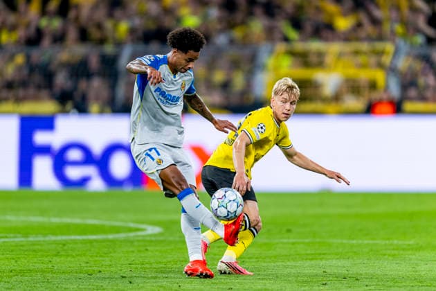DORTMUND Villarreal CF forward Tajon Buchanan and Borussia Dortmund defender Daniel Svensson during the UEFA Champions League match between Borussia Dortmund and Villarreal at BVB Stadion Dortmund on September 8, 2026, in Dortmund, Germany. Photo by DeFodi Images