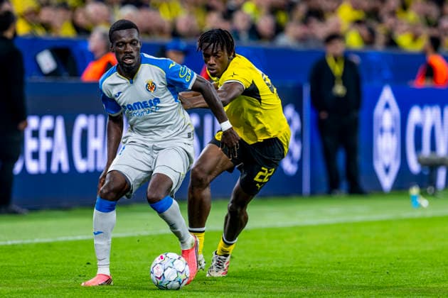 DORTMUND l Villarreal CF midfielder Tani Oluwaseyi and Borussia Dortmund defender Joane Gadou during the UEFA Champions League match between Borussia Dortmund and Villarreal at BVB Stadion Dortmund on September 8, 2026, in Dortmund, Germany. Photo by DeFodi Images