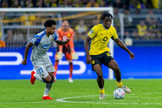 DORTMUND l r Villarreal CF forward Tajon Buchanan and Borussia Dortmund defender Joane Gadou during the UEFA Champions League match between Borussia Dortmund and Villarreal at BVB Stadion Dortmund on September 8, 2026, in Dortmund, Germany. Photo by DeFodi Images