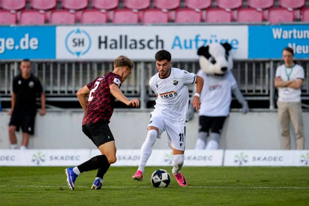 From left: Tino Bradara (SGV), 2, Mert Tasdelen (SVS), 11, tackle, game action, duel, tackle, tackling, dynamism, action, 08 09 2026, Sandhausen, Germany, soccer, Regionalliga Southwest, SV Sandhausen, SGV Heilbronn Freiberg xozx