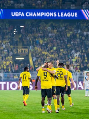 DORTMUND Borussia Dortmund forward Serhou Guirassy and Borussia Dortmund defender Waldemar Anton celebrate the 3-1 victory during the UEFA Champions League match between Borussia Dortmund and Villarreal at BVB Stadion Dortmund on September 8, 2026, in Dortmund, Germany. Photo by DeFodi Images