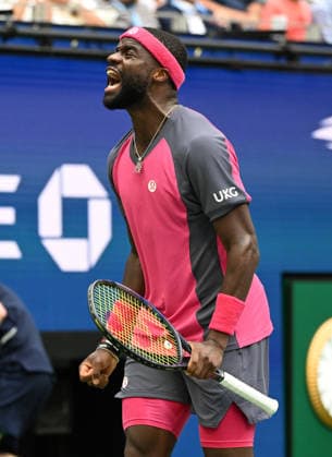 Frances Tiafoe reacts against Alex Michelsen during the quarter finals in Arthur Ashe Stadium at the 2026 US Open Tennis Championship held at the USTA Billie Jean King National Tennis Center in New York City on Tuesday, September 8, 2026.  NYP20260908516 LARRYxMARANO