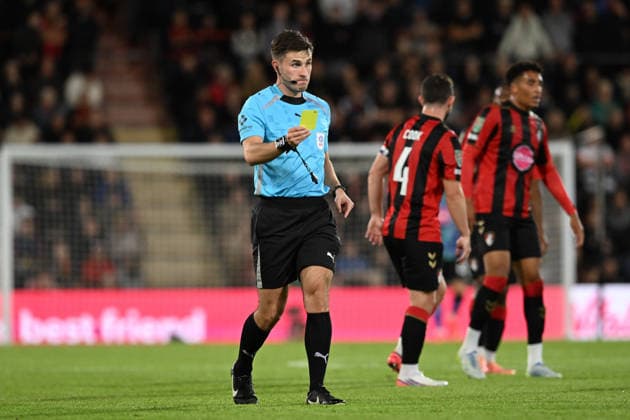 Bournemouth v Lincoln City, EFL Cup Referee Elliot Bell shows a yellow card to a Lincoln City player during the EFL Cup match between Bournemouth and Lincoln City at the Vitality Stadium, Bournemouth, UK on 8 September 2026. Bournemouth Vitality Stadium Dorset UK Editorial use only DataCo restrictions apply See www.football-dataco.com , Copyright: xGrahamxHuntx PSI-24849-0214