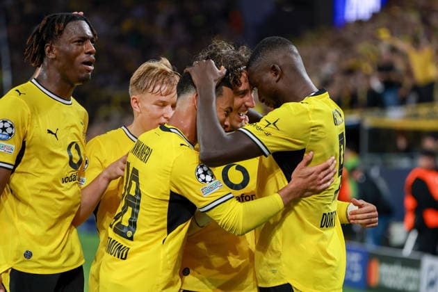UEFA Champions League: Borussia Dortmund vs. Villarreal on September 8, 2026, at Signal Iduna Park in Dortmund—Cheers, goal celebrations, Goal scorers: Serhou Guirassy (Dortmund 9) celebrates his goal to make it 2–1 with Fabio Silva (Dortmund 21), Ethan Nwaneri (Dortmund 18), and Joane Gadou (Dortmund 22) MH