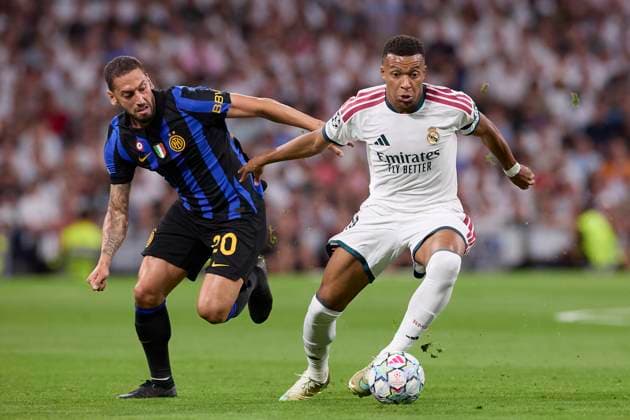 UEFA Champions League 2026 2027 - Real Madrid CF and FC Internazionale Milano in Madrid, Spain - 08 Sep 2026 Hakan Calhanoglu (FC Internazionale Milano) and Kylian Mbappe (Real Madrid CF) are seen in action during the UEFA Champions League 2026 2027 match between Real Madrid CF and FC Internazionale Milano Final score: Real Madrid CF 2-1 FC Internazionale Milano Madrid Spain Copyright: xFedericoxTitonex xSOPAxImagesx Federico-Titone-1448057
