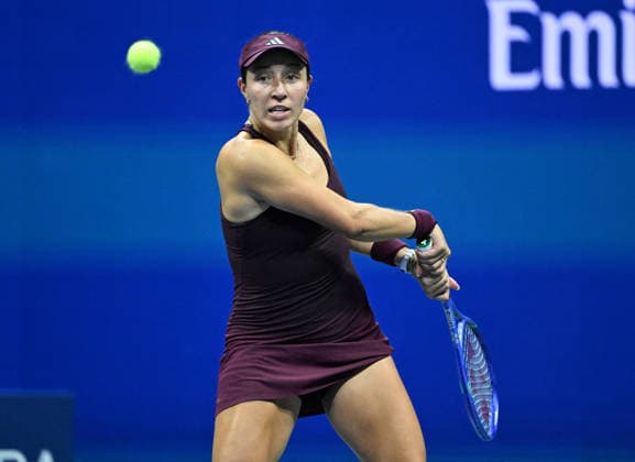 Jessica Pegula returns a volley to Emma Navarro during the quarter finals in Arthur Ashe Stadium at the 2026 US Open Tennis Championship held at the USTA Billie Jean King National Tennis Center in New York City on Tuesday, September 8, 2026.  NYP20260908533 LARRYxMARANO