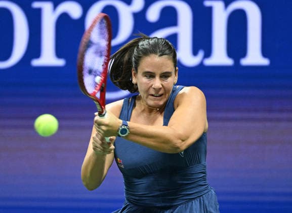 Emma Navarro returns a volley to Jessica Pegula during the quarter finals in Arthur Ashe Stadium at the 2026 US Open Tennis Championship held at the USTA Billie Jean King National Tennis Center in New York City on Tuesday, September 8, 2026.  NYP20260908539 LARRYxMARANO