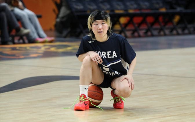 Heji An is sitting on the ball. Sports: Basketball. FIBA World Cup. Women s World Championship. 2026-2027 season. August 9, 2026. DBB (Germany, GER) vs. South Korea (KOR)