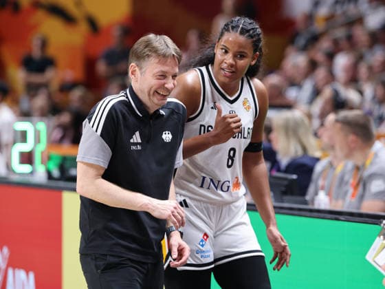 National Team Coach Olaf Lange laughs with Nyara Sabally; Upper Body; Sports; Basketball; FIBA World Cup; Women s World Championship; 2026-2027 Season; August 9, 2026; DBB; Germany (GER) vs. South Korea (KOR)