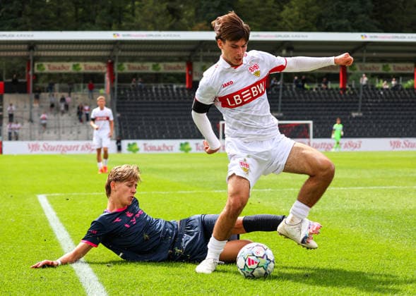 September 9, 2026, Stuttgart, UEFA Champions League, 2026–2027 season, VfB Stuttgart U19 vs. Viking U19, penalty kick, foul, from left: Jonathan Debes (FK), Neno Zezelj (VfB)
