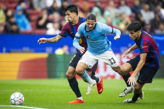 BARCELONA - (lr) JoÄo Cancelo of FC Barcelona, Barca Anis Hadj Moussa of Feyenoord, Pau Cubarsi of FC Barcelona during the UEFA Champions League match between FC Barcelona and Feyenoord at Camp Nou on September 9, 2026 in Barcelona, Spain. KOEN VAN WEEL ANP UEFA Champions League 2026 27 xVIxANPxSportx xxANPxIVx 567769696 originalFilename: 567769696.jpg