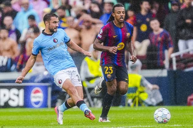 BARCELONA - Charles Vanhoutte of Feyenoord battles for possession with Jules Kounde of FC Barcelona, Barca during the UEFA Champions League match between FC Barcelona and Feyenoord at the Spotify Camp Nou on 09 September 2026 in Barcelona, Spain. GEERT VAN ERVEN ANP UEFA Champions League 2026 27 xVIxANPxSportx xMarcelxterxBalsxIVx 567769771 originalFilename: 567769771.jpg