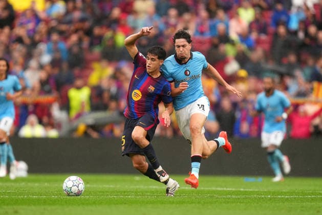 UEFA Champions League: FC Barcelona, Barca v Feyenoord Rotterdam Barcelona - Pau Cubarsi of FC Barcelona battles for possession with Nacho Ferri of Feyenoord Rotterdam during the first competition round of the 2026 2027 UEFA Champions League season. The match is set between FC Barcelona and Feyenoord Rotterdam at Camp Nou on 9 September 2026 in Barcelona, Spain. (Hero Images Yannick Verhoeven) Copyright: xYannickxVerhoevenx