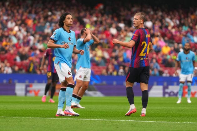 UEFA Champions League: FC Barcelona, Barca v Feyenoord Rotterdam Barcelona - Gjivai Zechiel of Feyenoord Rotterdam and Dani Olmo of FC Barcelona look dejected during the first competition round of the 2026 2027 UEFA Champions League season. The match is set between FC Barcelona and Feyenoord Rotterdam at Camp Nou on 9 September 2026 in Barcelona, Spain. (Hero Images Yannick Verhoeven) Copyright: xYannickxVerhoevenx