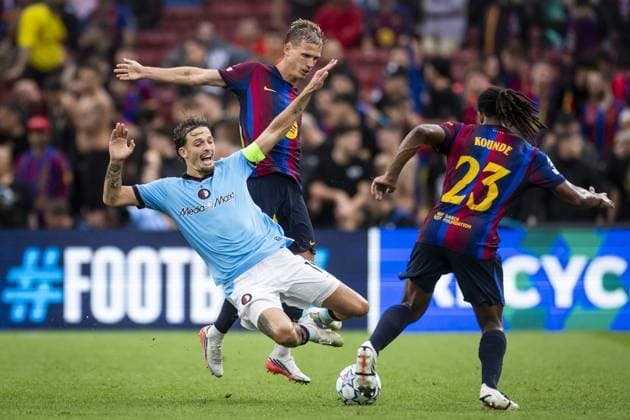 BARCELONA - (lr) Luciano Valente of Feyenoord, Dani Olmo of FC Barcelona, Barca Jules KoundÃ of FC Barcelona during the UEFA Champions League match between FC Barcelona and Feyenoord at Camp Nou on September 9, 2026 in Barcelona, Spain. KOEN VAN WEEL ANP UEFA Champions League 2026 27 xVIxANPxSportx xxANPxIVx 567771555 originalFilename: 567771555.jpg