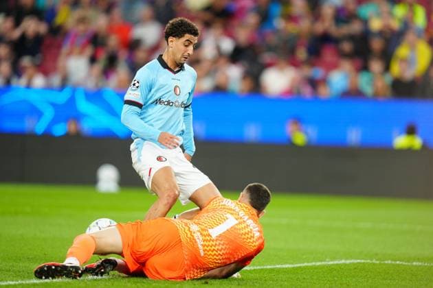 BARCELONA , 09-09-2026 , Spotify Camp Nou , season 2026 2027 , UEFA Champions League football , match between FC Barcelona, Barca and Feyenoord Rotterdam , picture shows Feyenoord player Oussama Targhalline and FC Barcelona goalkeeper Joan Garcia Barcelona - Feyenoord  x206778633x Copyright: